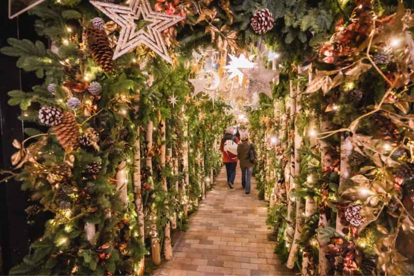 An alleyway filled with Christmas decorations when Christmas shopping in Belfast