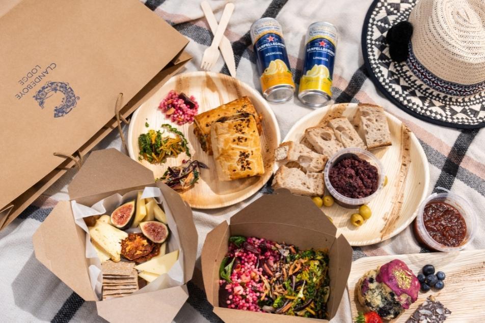 A picnic spread on a blanket in a picnic spot in Northern Ireland