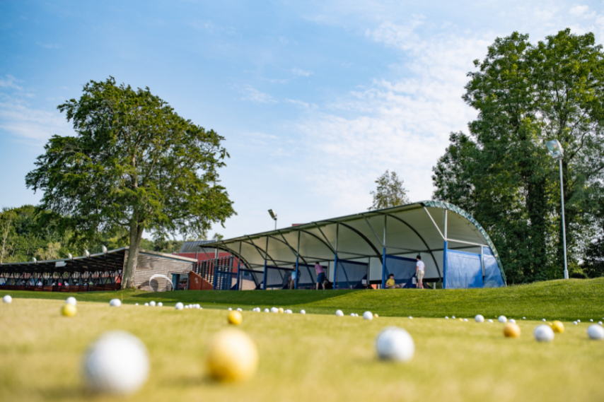 Golf balls on a driving range, a popular thing to do in Bangor Northern Ireland.