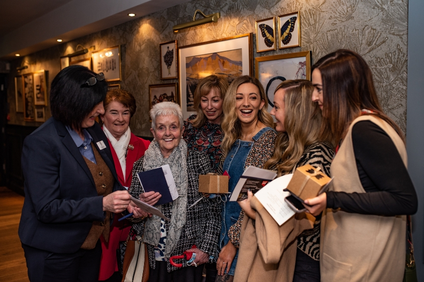 Guests chatting with wedding suppliers at a wedding fair in Northern Ireland