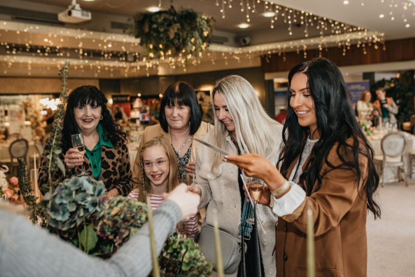 Guests enjoying interactive demonstrations at a Spring Wedding Fair