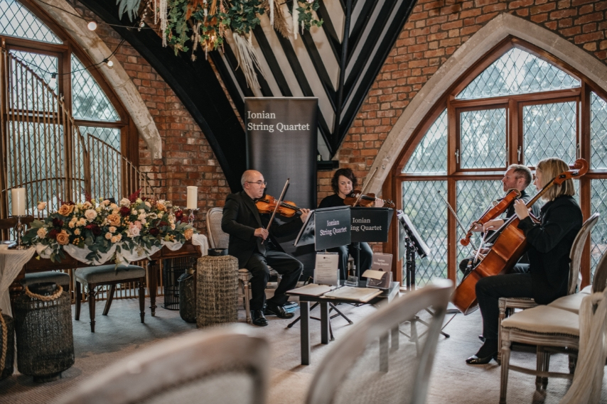 Wedding musicians performing live during a wedding fair at Clandeboye Lodge