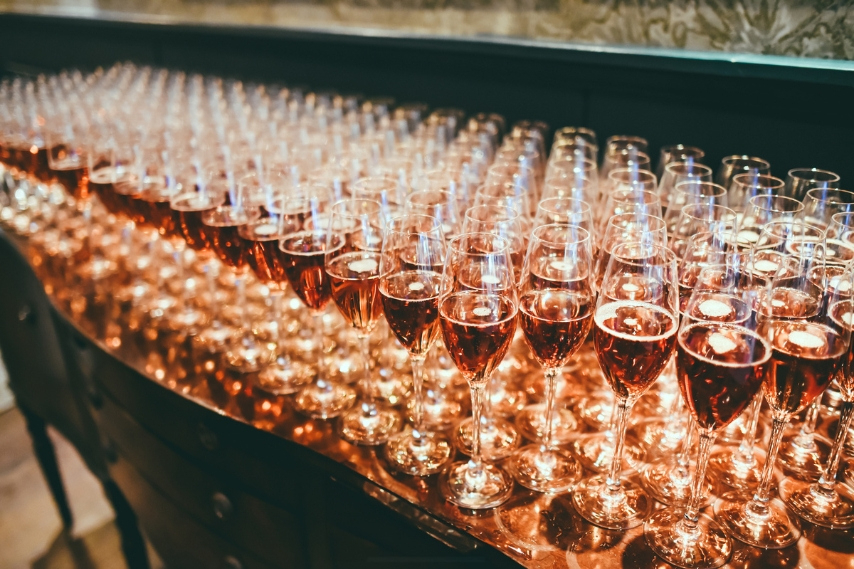 Glasses of rose prosecco on a table at an event venue in Northern Ireland.