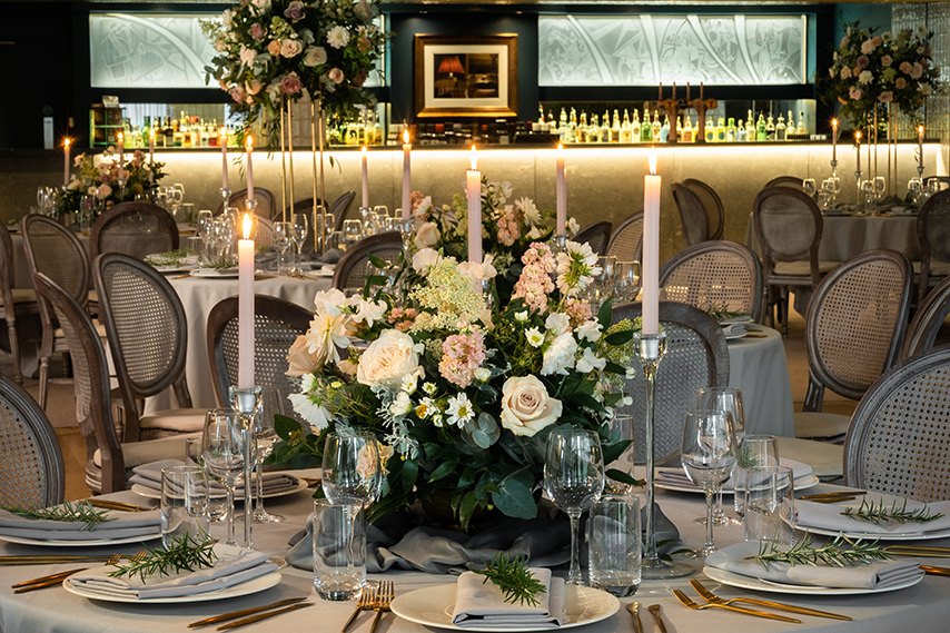 Floral centrepiece with candles at our Wedding Venue in Northern Ireland.